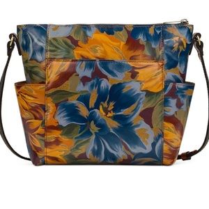 Luxurious YOU’ll look chic carrying the Aveley Leather Crossbody Patricia Nash